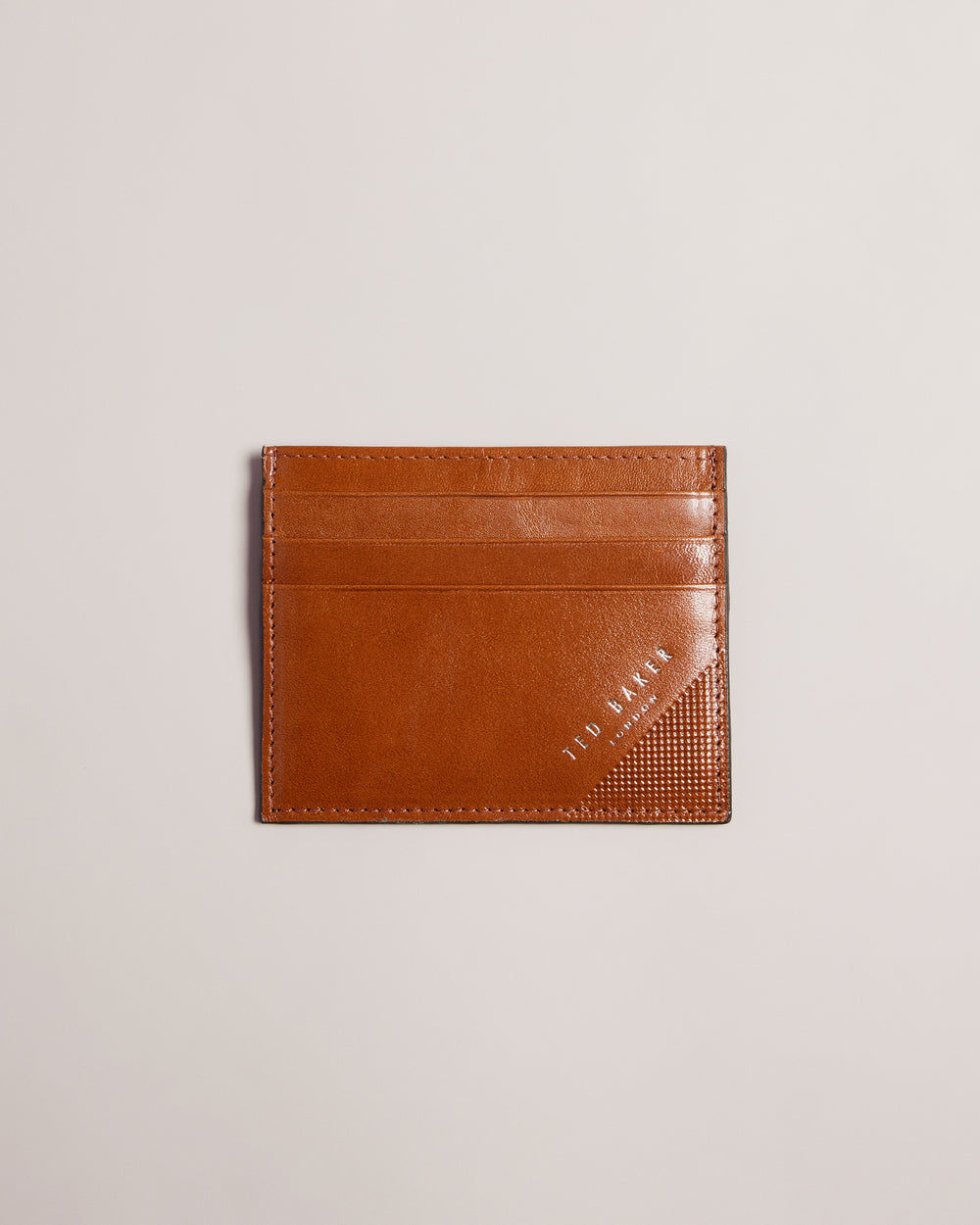 RAFFLE | TAN